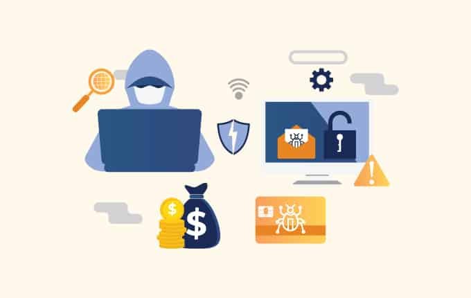 A hoodie-clad man with a laptop and money.