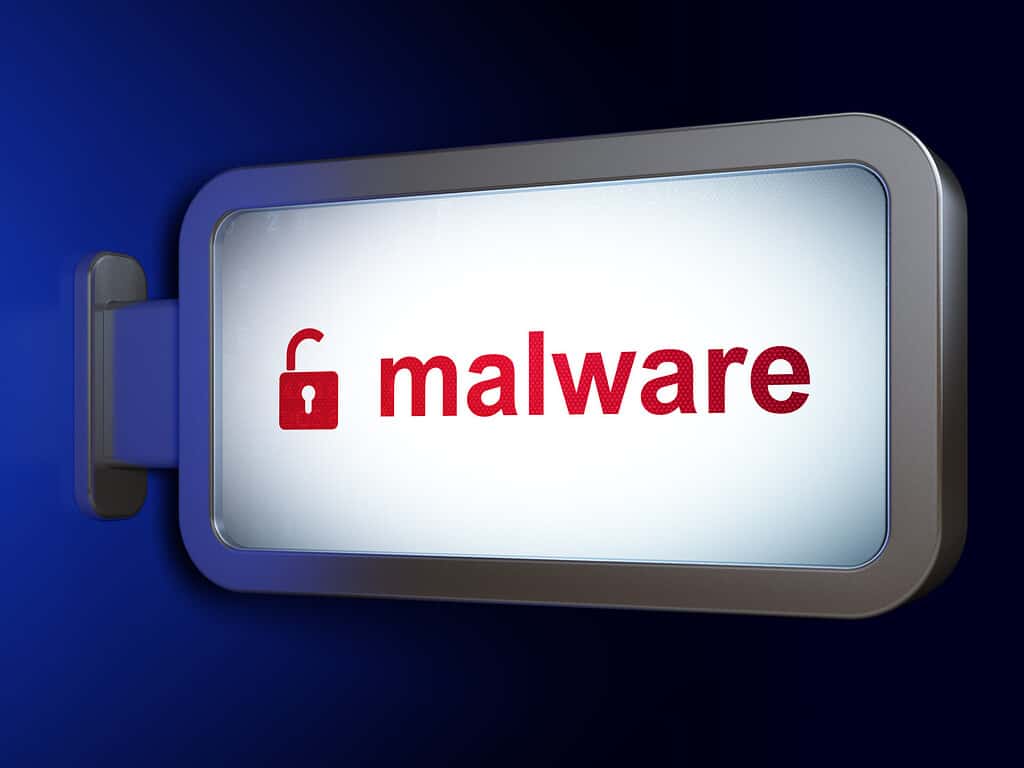 25690778 security concept malware and opened padlock on billboard background